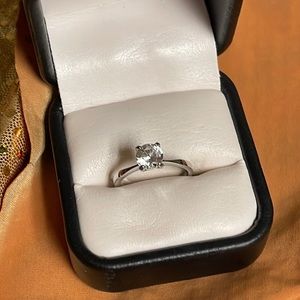 Avon classic Zircon with sterling silver band.